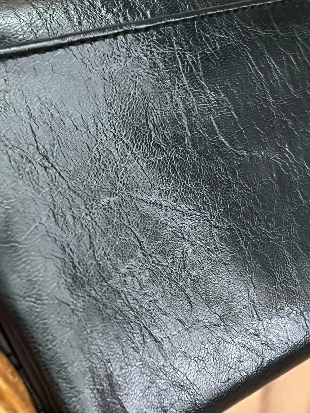 Black Fold-Over Clutch Wallet new without tags. Never used. Genuine leather
